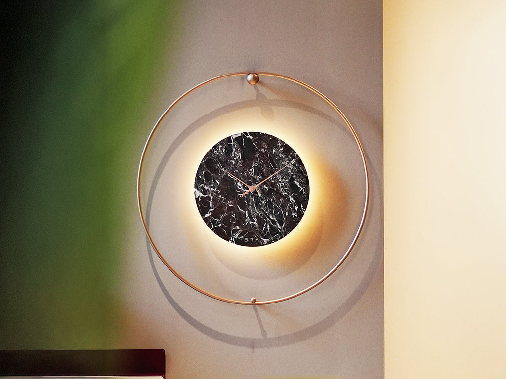 Come scegliere l'orologio da parete perfetto per ogni stanza